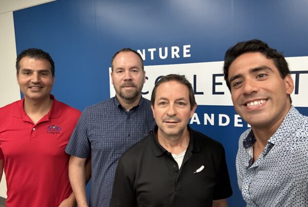 Four AstraQua team members posing together at the UCLA accelerator.